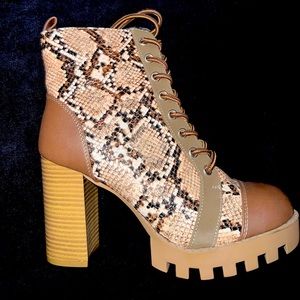 Nude snake print boots. Lace ups with zippers on the side size